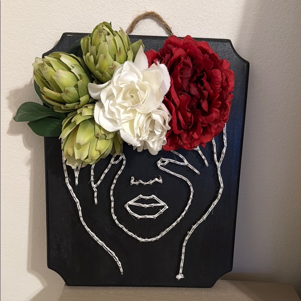 Black Wall Art with Floral Accents